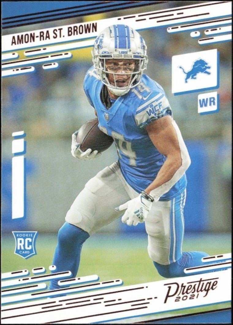 Amon-Ra St. Brown 2021 Panini Chronicles #234 Football Trading Card - Front 2021 Panini Chronicles Amon-Ra St. Brown #234 football trading card front