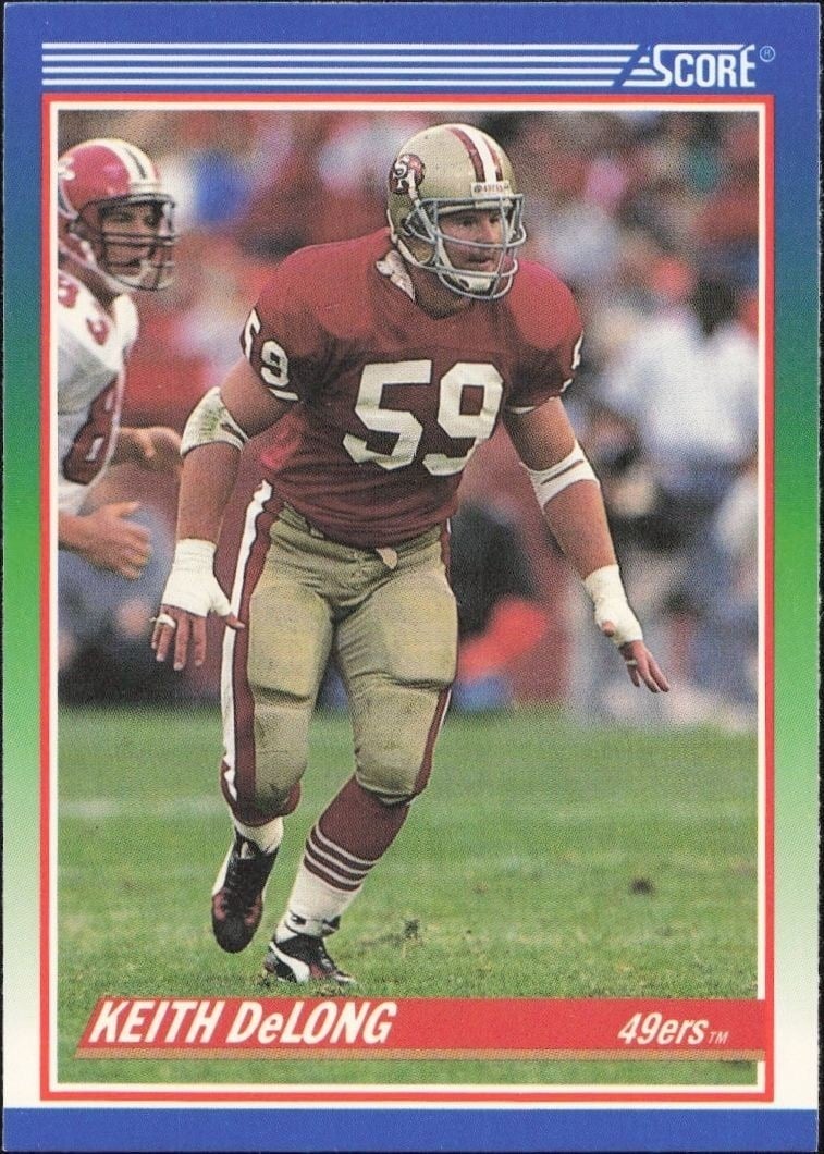 Keith DeLong 1990 Score #392 Football Trading Card - Front 1990 Score Keith DeLong #392 football trading card front