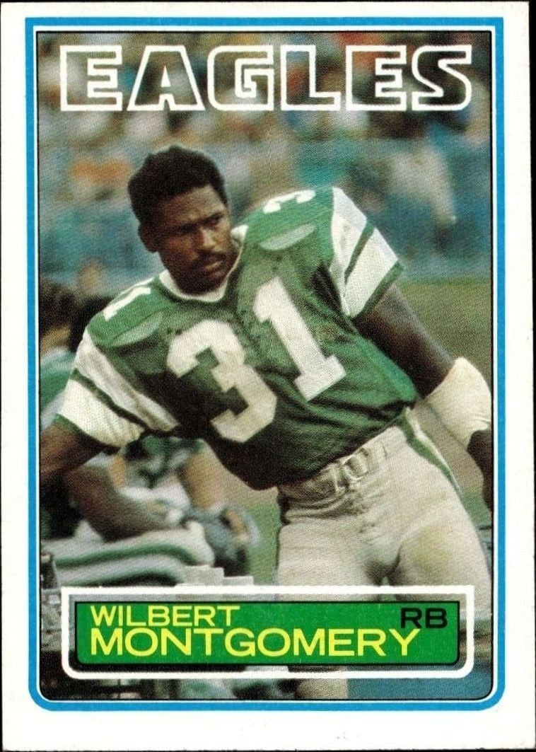 Wilbert Montgomery 1983 Topps #144 Football Trading Card - Front 1983 Topps Wilbert Montgomery #144 football trading card front