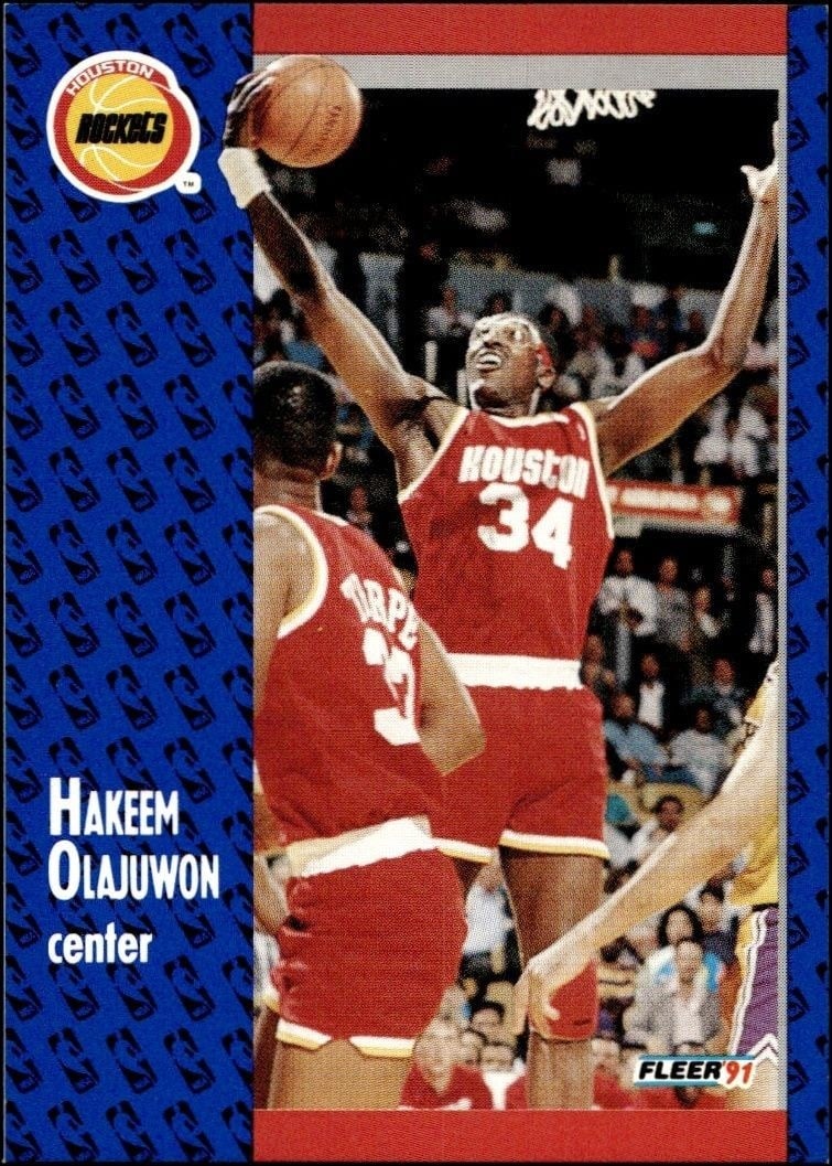 Hakeem Olajuwon 1991-92 Fleer #77 Basketball Trading Card - Front 1991-92 Fleer Hakeem Olajuwon #77 basketball trading card front
