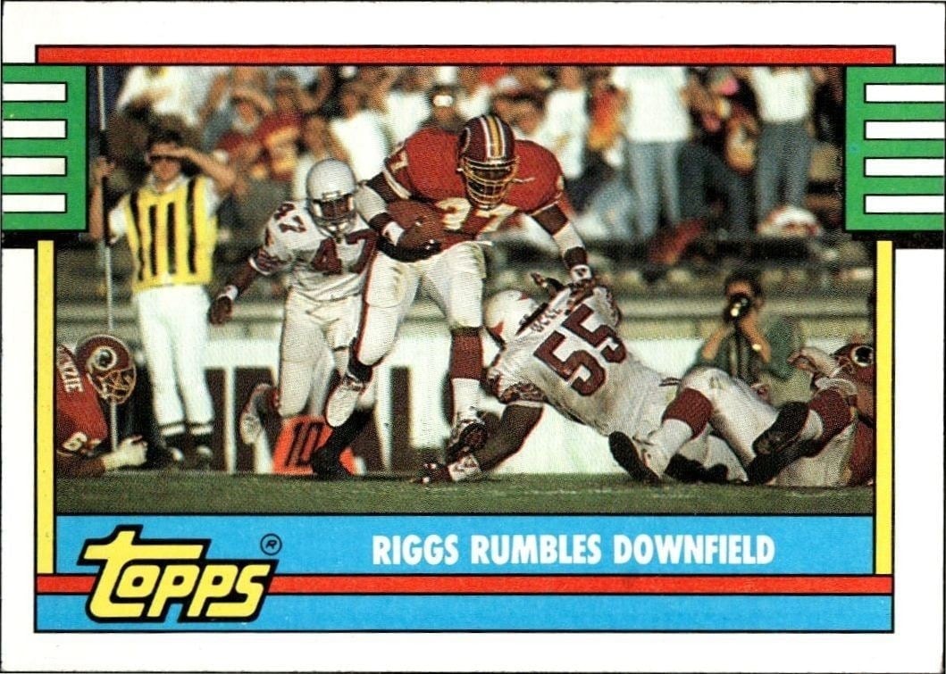 Riggs Rumbles Downfield 1990 Topps #524 Football Trading Card - Front 1990 Topps Riggs Rumbles Downfield #524 football trading card front