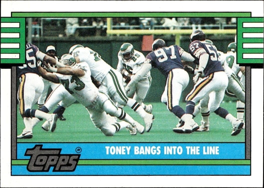Toney Bangs Into The Line 1990 Topps #513 Football Trading Card - Front 1990 Topps Toney Bangs Into The Line #513 football trading card front