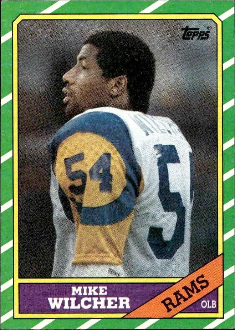 Mike Wilcher 1986 Topps #85 Football Trading Card - Front 1986 Topps Mike Wilcher #85 football trading card front