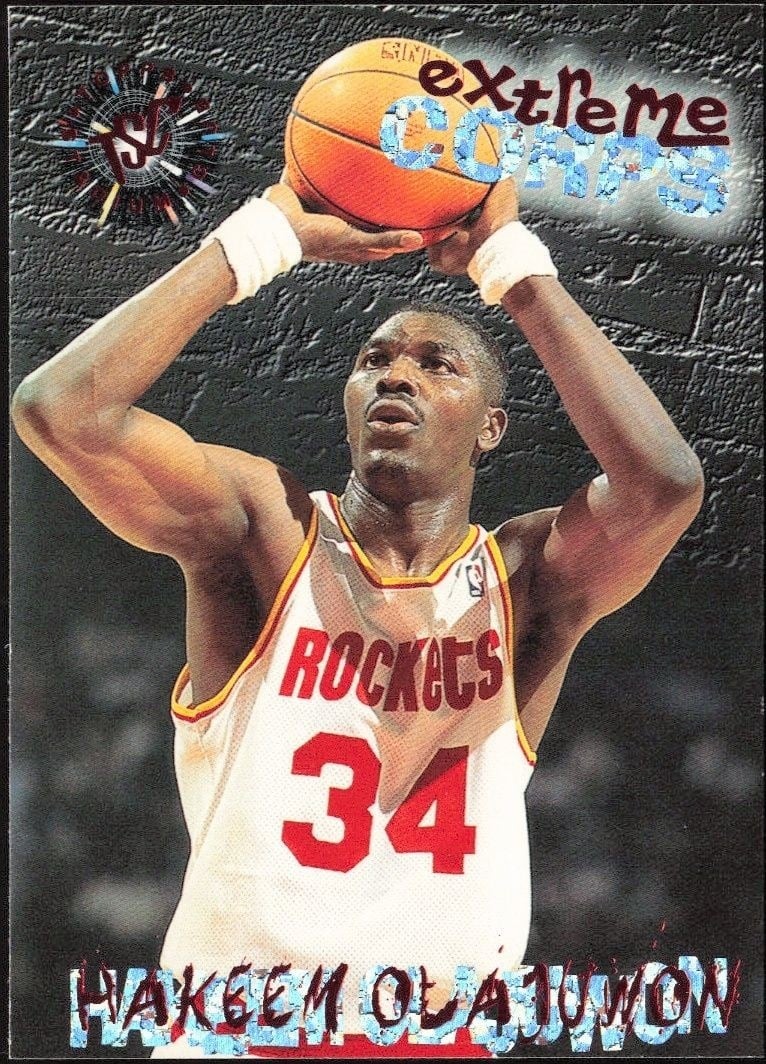 Hakeem Olajuwon 1995-96 Topps Stadium Club #110 Basketball Trading Card - Front 1995-96 Topps Stadium Club Hakeem Olajuwon #110 basketball trading card front