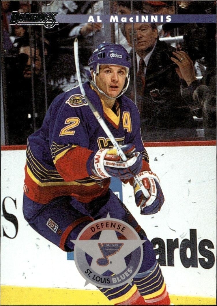 Al MacInnis 1996-97 Donruss #12 Hockey Trading Card - Front 1996-97 Donruss Al MacInnis #12 hockey trading card front