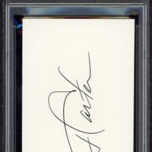 Authenticated Jimmy Carter autograph in protective display slab for collectors.