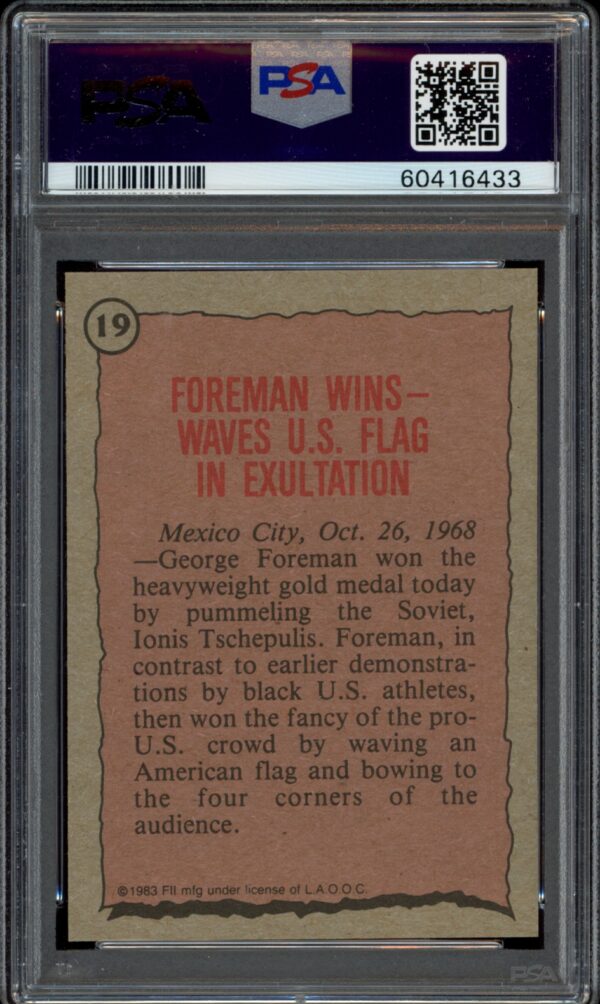 Vintage PSA graded newspaper clipping featuring George Foremans iconic victory.