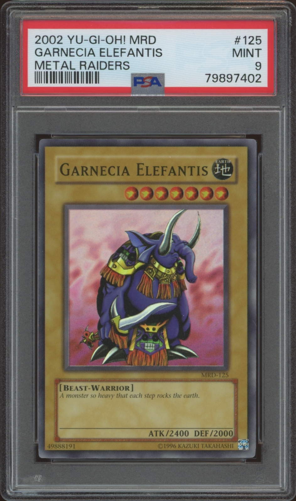 Graded 2002 Yu-Gi-Oh! Garnecia Elefantis card from Metal Raiders set in PSA protective slab.