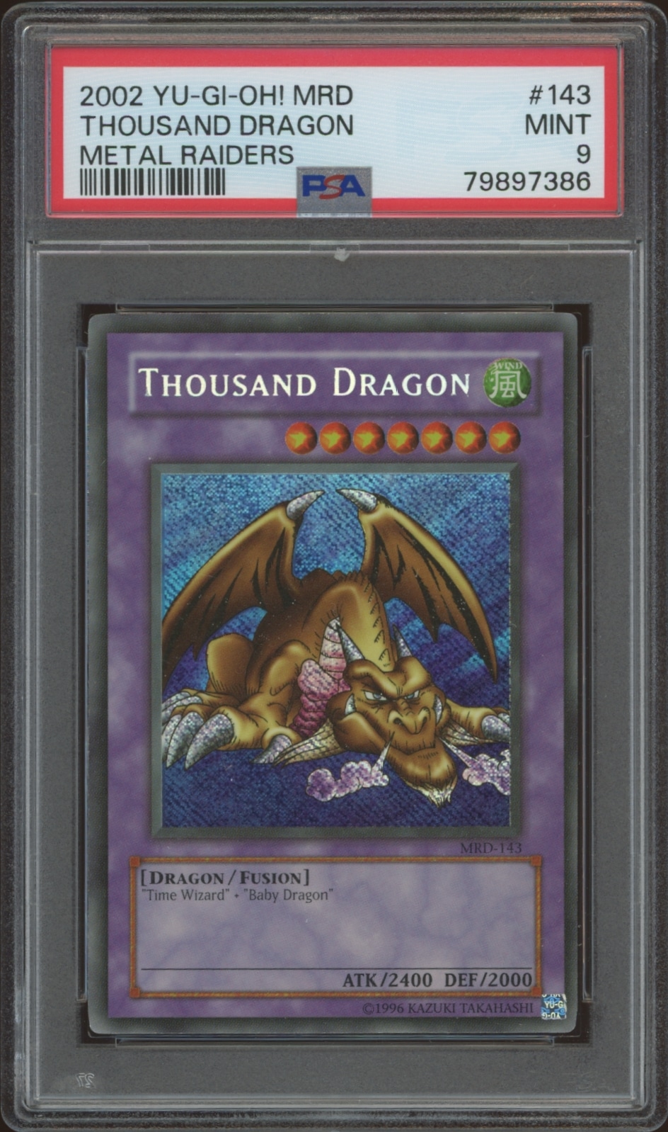 Graded MINT 9 Thousand Dragon Yu-Gi-Oh! card from 2002 Metal Raiders set.