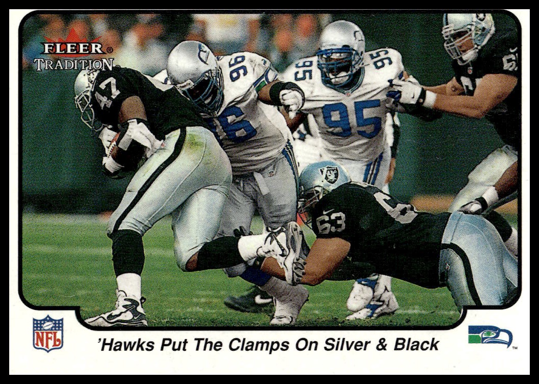2000 Fleer Tradition Glossy 'Hawks Put the Clamps on Silver & Black #393 (Front)
