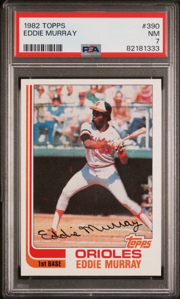 1982 Topps Eddie Murray #390, graded PSA 7, featuring classic Orioles batting pose.