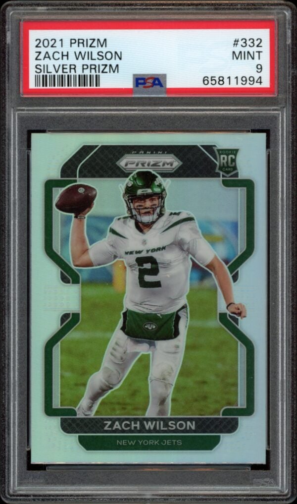 Zach Wilson 2021 Prizm Rookie Card, PSA 9, in Jets jersey, green prismatic background.