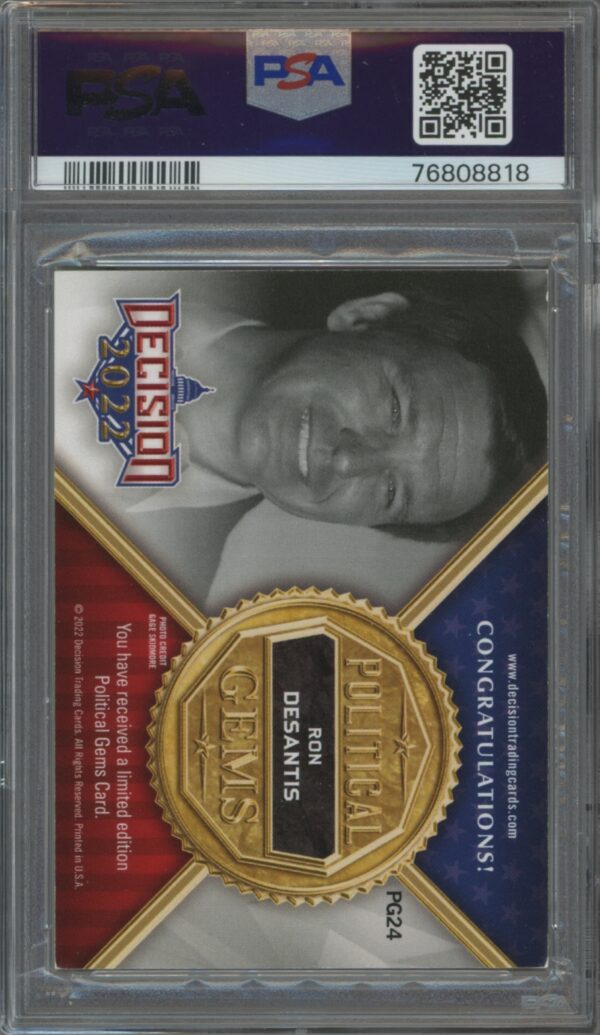 PSA-graded 2022 Ron DeSantis card with gold accents and medallion, authenticated for collectors.